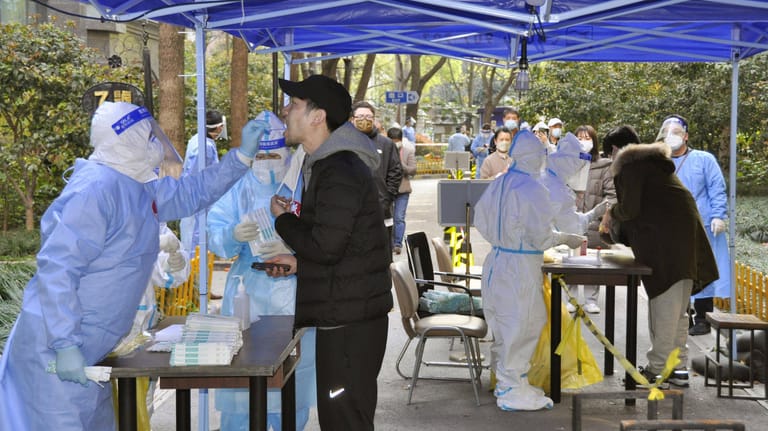Lockdown in Shanghai People take PCR tests for the novel coronavirus in Shanghai on April 4, 2022, as a lockdown continu