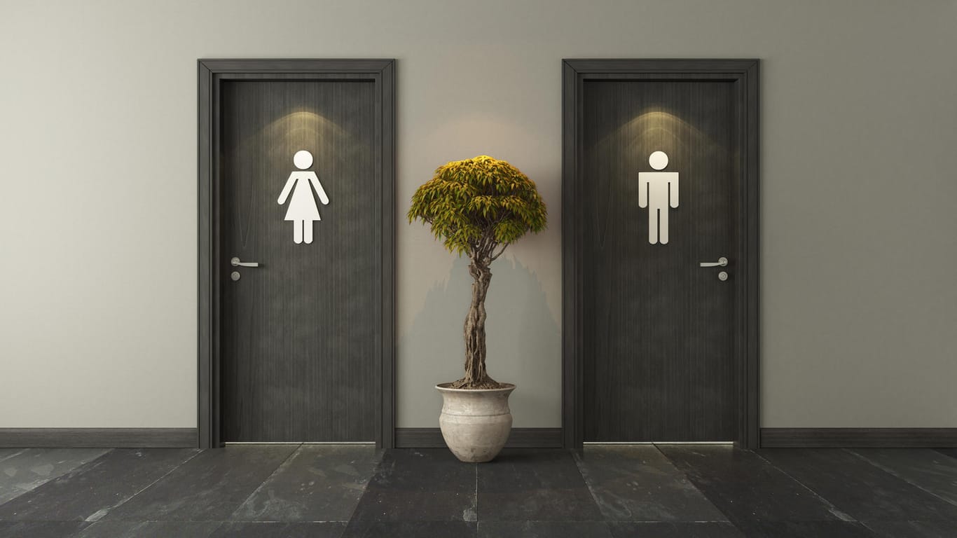 Eingänge zu Toiletten mit männlichem und weiblichem Symbol.