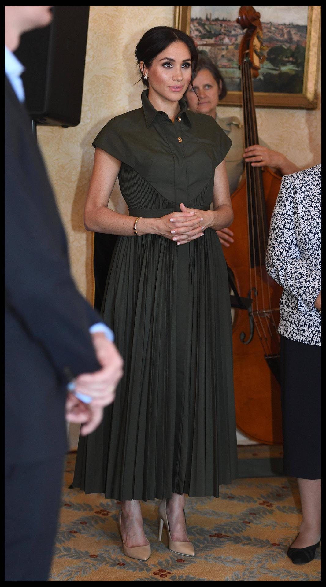 Empfang in Sydney: Meghan trägt ein olivgrünes Kleid des US-amerikanischen Designers Brandon Maxwell.