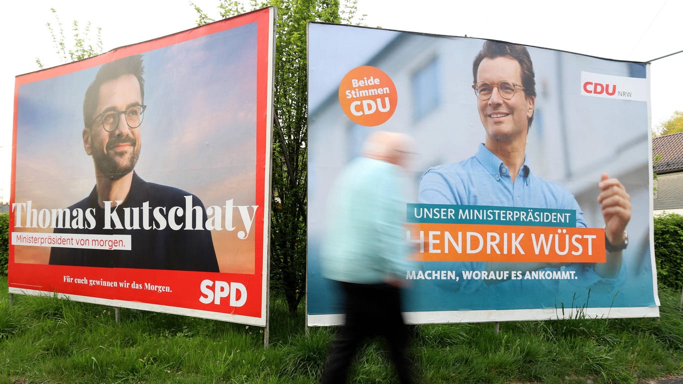 Plakate zur Landtagswahl 2022 in Nordrhein-Westfalen: Thomas Kutschaty (SPD) und Hendrik Wüst (CDU) Kämpfen um den Wahlsieg.
