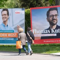 Die Wahlplakate der beiden Spitzenkandidaten von CDU und SPD für die Landtagswahl in NRW (Archivbild): Beide treten kurz vor der Wahl im Fernsehen gegeneinander an.