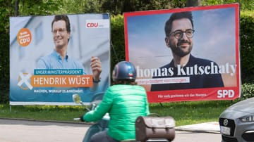 Der Ministerpräsident Hendrik Wüst (CDU., li.) und sein SPD-Herausforderer Thomas Kutschaty (SPD, re.).