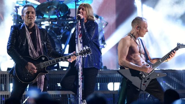 Vivian Campbell (l-r), Joe Elliott und Phil Collen 2019 in New York.