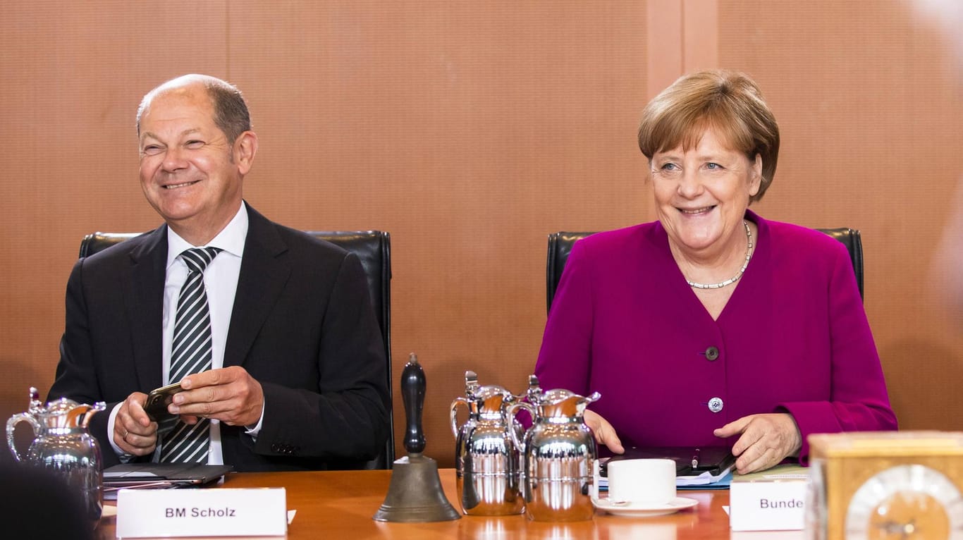 Angela Merkel und Olaf Scholz gut gelaunt: Wer hat was gesagt?