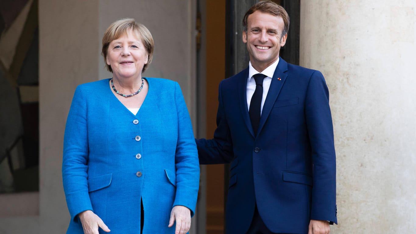 Die damalige Bundeskanzlerin Angela Merkel und der französische Präsident Emmanuel Macron 2021: "Es ist als Unterscheidung zu Macron zu verstehen, der die Nähe zu Deutschland immer wieder unterstreicht."