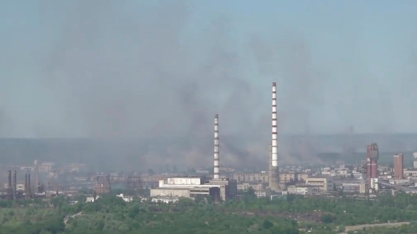 Black smoke billows over Sievierodonetsk Azot chemical plant as Russia's invasion on Ukraine continues, in Sievierodonetsk