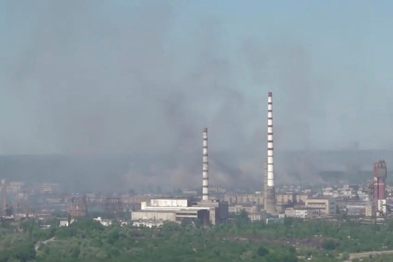 Black smoke billows over Sievierodonetsk Azot chemical plant as Russia's invasion on Ukraine continues, in Sievierodonetsk