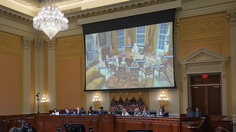 Dem Ausschuss wird eine Illustration gezeigt, die die Sitzpositionen der Teilnehmer im Weißen Haus darstellt.