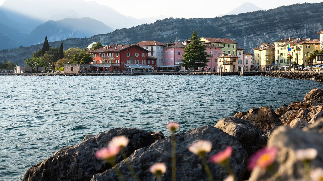 Lake Garda, Nago Torbole, Italy - 10 May 2022: View of Torbole on Lake Garda in summer in northern Italy, Trentino. Nago