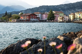Lake Garda, Nago Torbole, Italy - 10 May 2022: View of Torbole on Lake Garda in summer in northern Italy, Trentino. Nago
