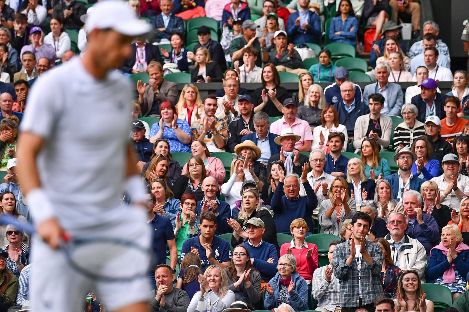 Mandatory Credit: Photo by James Veysey/Shutterstock (13008248fi) Andy Murray fans during his second round match Wimbled