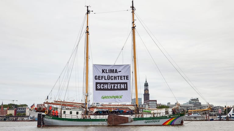 Greenpeace-Aktion zum Weltflüchtlingstag für Klima-Geflüchtete