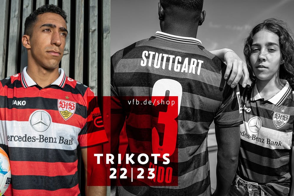 VfB-Spieler Tiago Tomas (links) und Models zeigen das neue Auswärtstrikot des VfB Stuttgart.