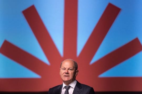 Bundeskanzler Olaf Scholz erhält für seine Rede beim Katholikentag in Stuttgart Gegenwind von Klimaaktivisten.