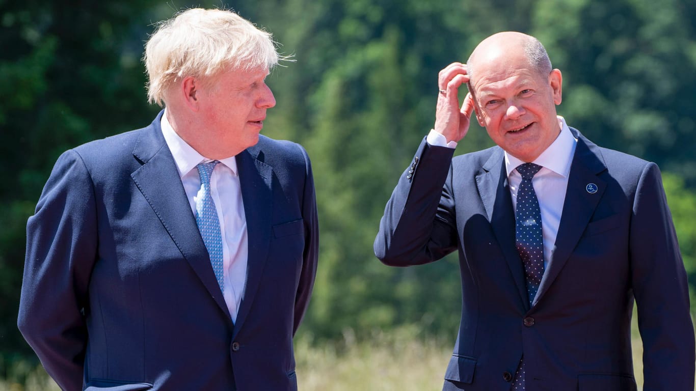 Boris Johnson und Olaf Scholz (Archivbild): Der Brite kritisiert Deutschlands Haltung vor dem Ukraine-Krieg.