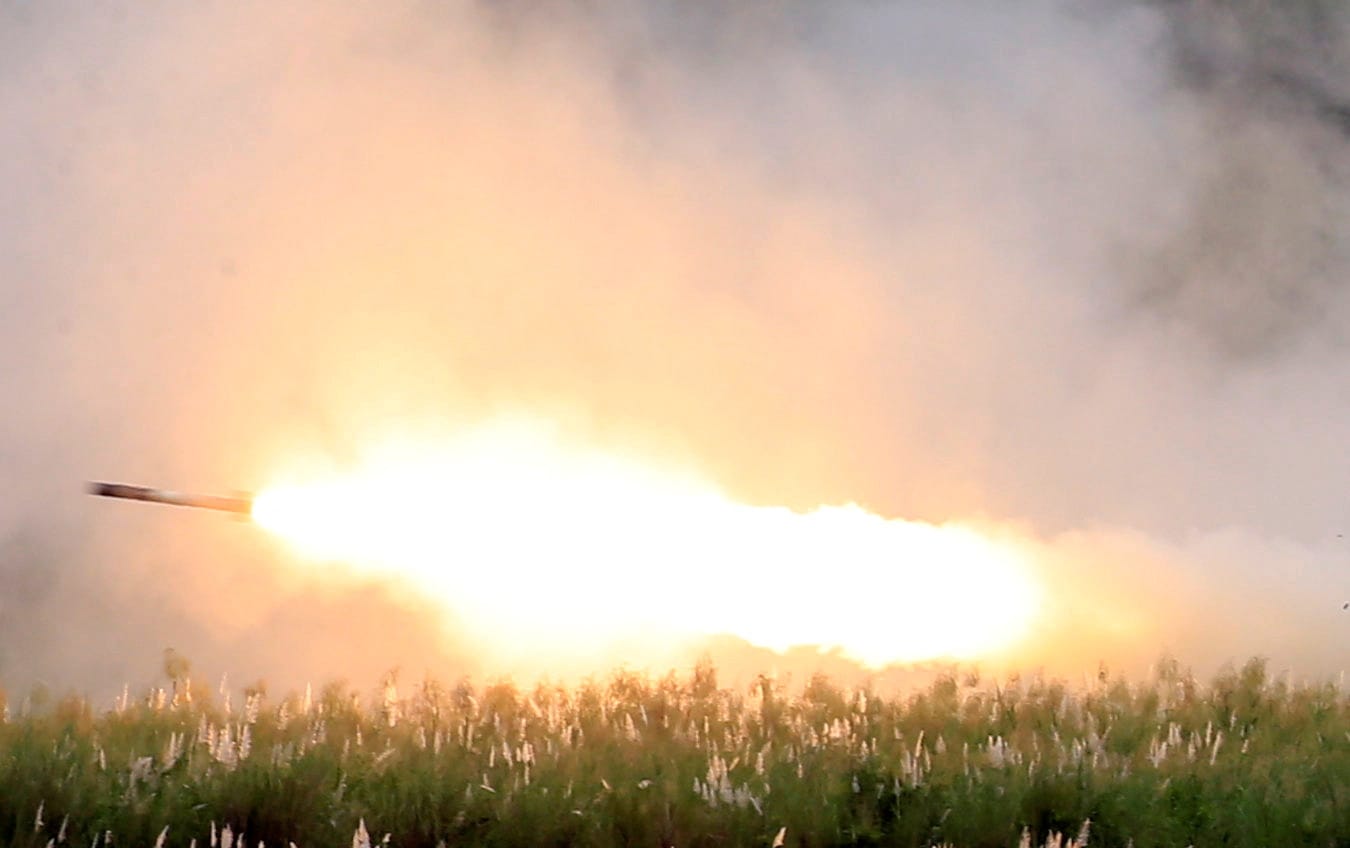 FILE PHOTO: U.S. military forces fire a High Mobility Artillery Rocket System (HIMARS) rocket during the annual Philippines-US live fire amphibious landing exercise (PHIBLEX) at Crow Valley in Capas, Tarlac province, north of Manila