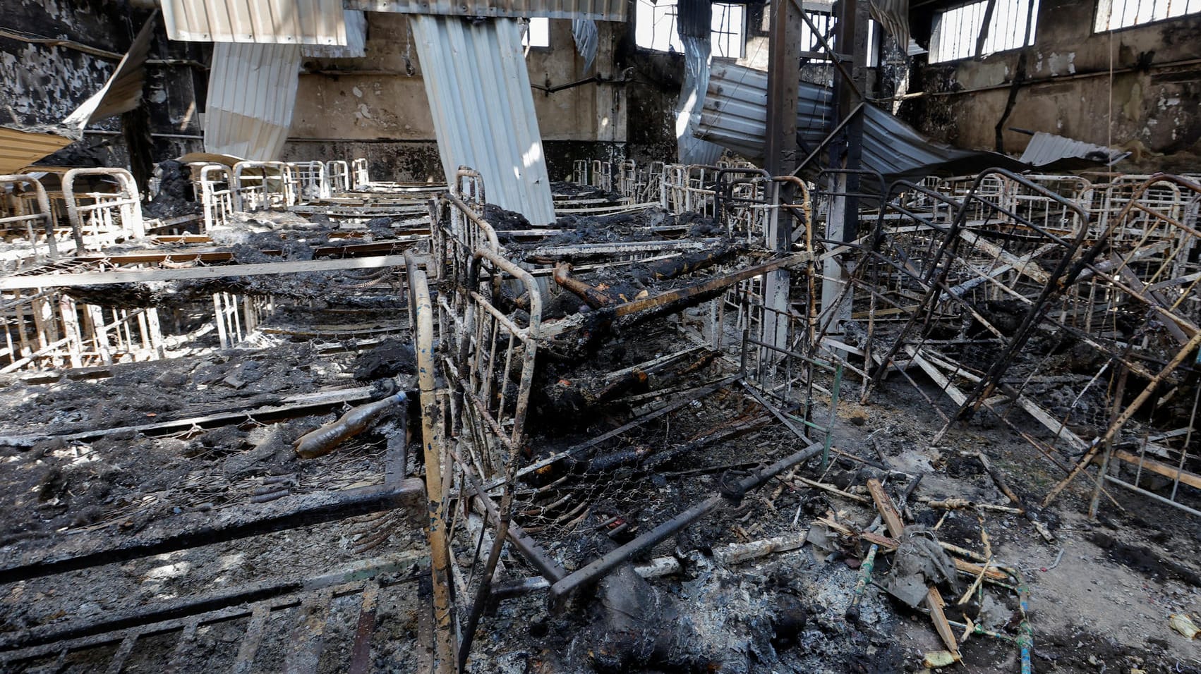 Aftermath of prison shelling in Olenivka