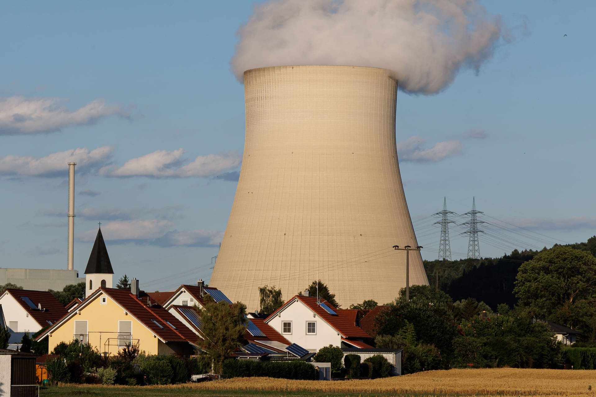 ESSENBACH, GERMANY - JULY 12: The Kernkraftwerk Isar nuclear power plant stands on July 12, 2022 near Essenbach, Germany. Germany's federal coalition government is considering letting Germany's remaining three nuclear power plants, including the Isar 2 reactor, which are supposed to shut down by the end of this year, to continue operating a short time longer in order to help bridge a possible energy shortfall this coming winter.