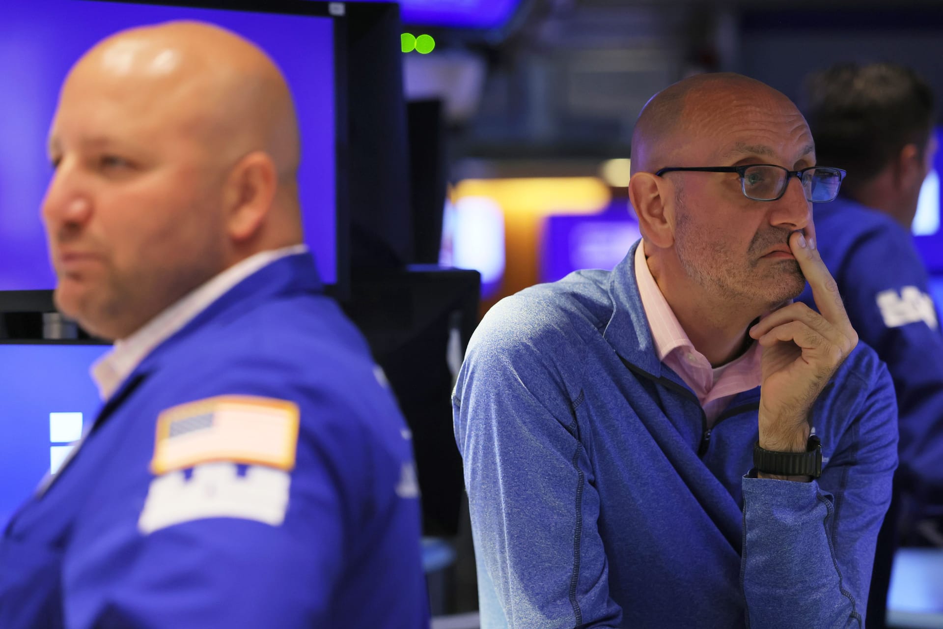 Traders work the floor of the New York Stock Exchange