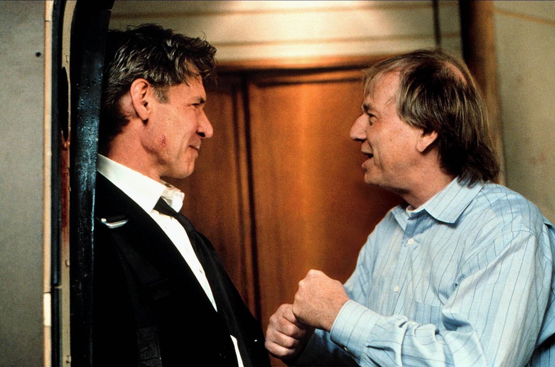Harrison Ford (l.) spielte 1997 in Wolfgang Petersens (r.) "Air Force One" die Hauptrolle.