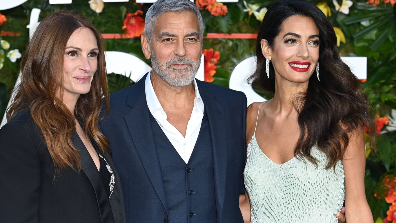 Julia Roberts, George Clooney und Amal Clooney: Die drei posierten bei der Premiere von "Ticket ins Paradies" in London für die Fotografen.