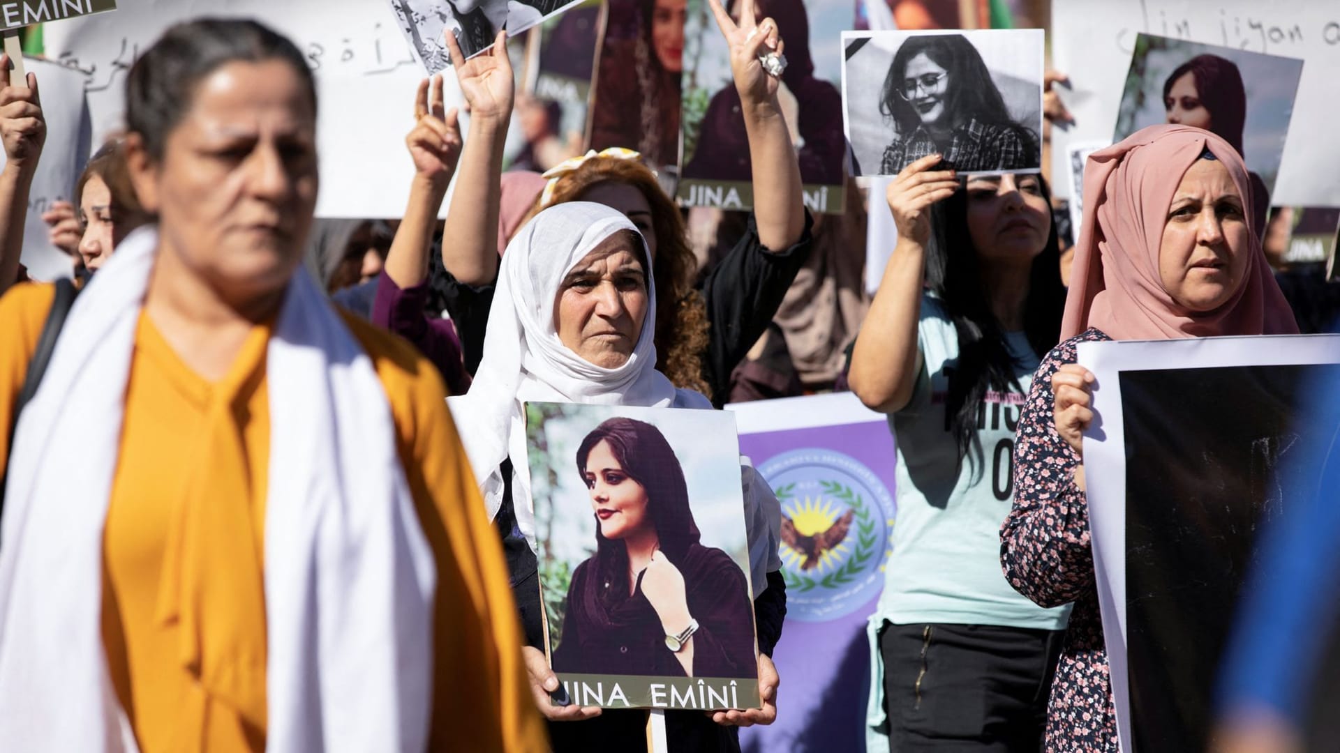 Women protest over the death of Mahsa Amini in Iran, in the Kurdish-controlled city of Qamishli