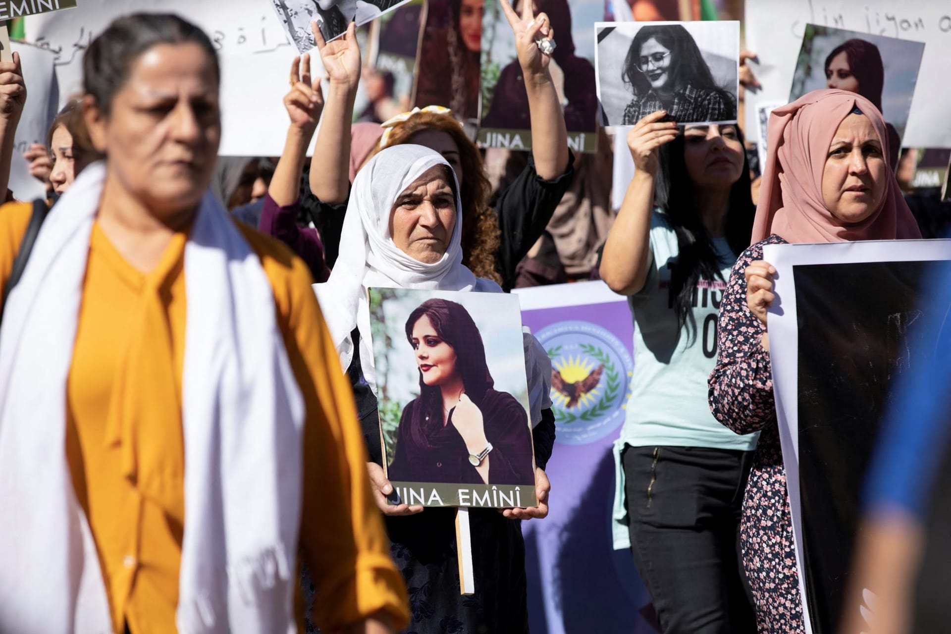 Women protest over the death of Mahsa Amini in Iran, in the Kurdish-controlled city of Qamishli