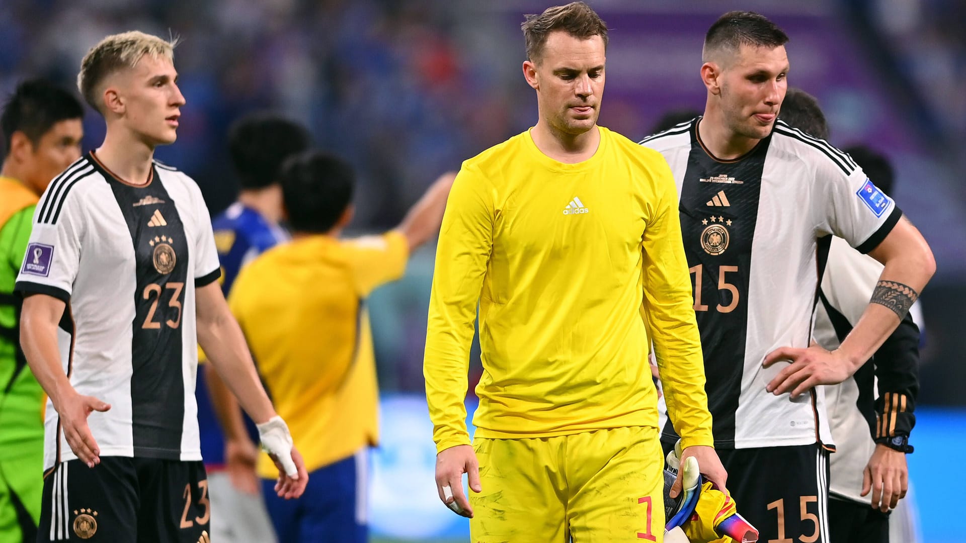 Geknickt: Die deutsche Mannschaft nach dem 1:2 zum WM-Start gegen Japan.