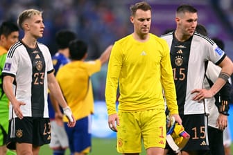 Geknickt: Die deutsche Mannschaft nach dem 1:2 zum WM-Start gegen Japan.