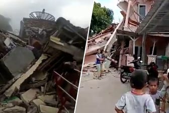 Erdbebenschäden in Indonesien, Mutter mit Kindern vor Trümmern