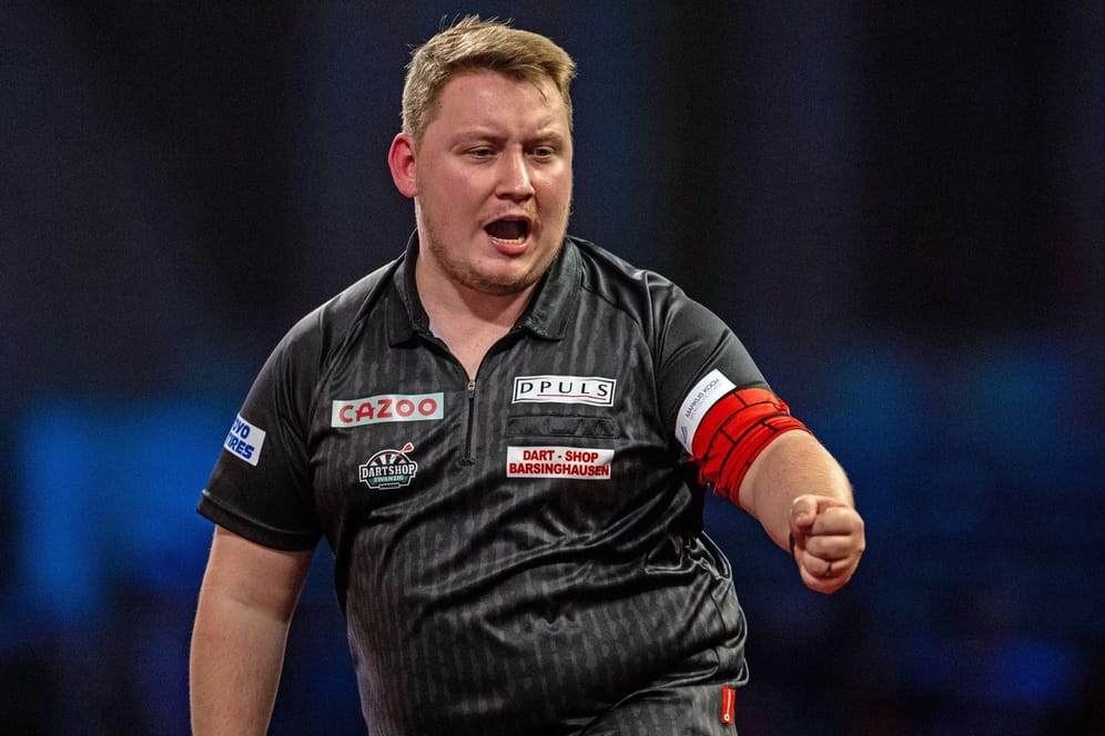 Martin Schindler reagiert während des Matches bei der Darts-WM: Am Ende verlor er gegen Michael Smith.
