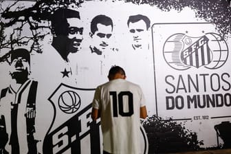 People mourn the death of Brazilian soccer legend Pele, in Santos