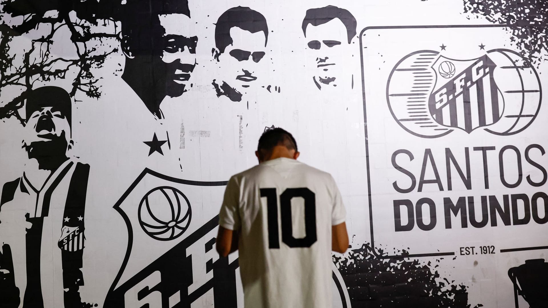 People mourn the death of Brazilian soccer legend Pele, in Santos