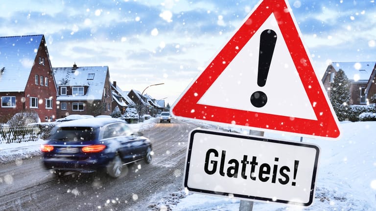 Gefahrenschild mit Aufschrift Glatteis (Montage): Vor allem südlich von Hannover muss mit Glätte gerechnet werden.