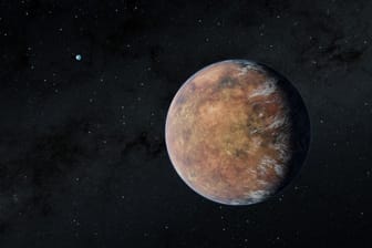 Künstlerische Darstellung von TOI 700 e: Der Exoplanet kreist in einer bewohnbaren Zone um seinen Stern.