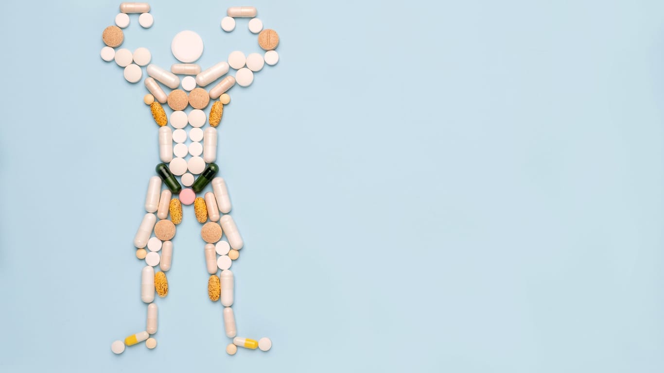 Die Silhouette eines Bodybuilders, zusammengesetzt aus Tabletten