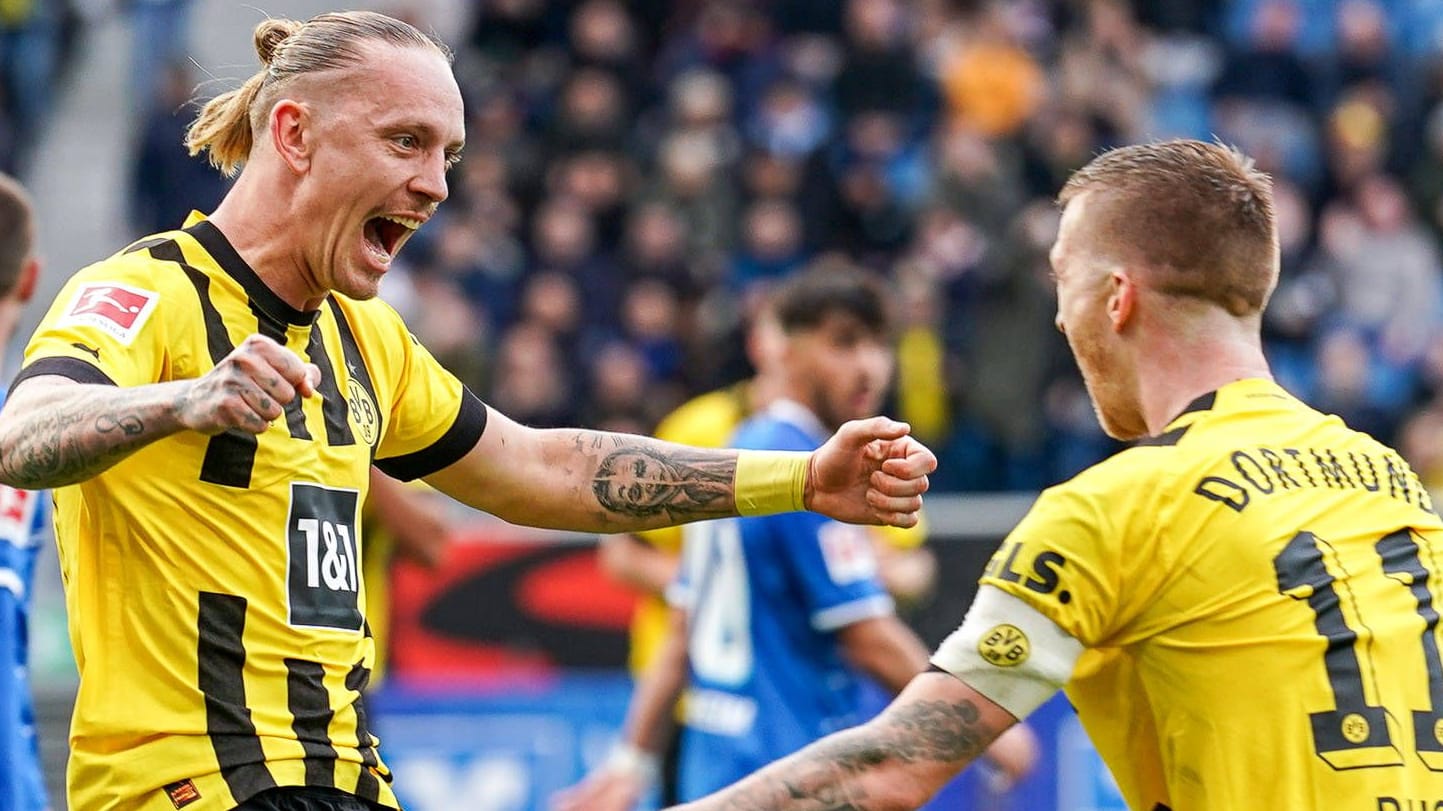 Spitzenreiter: Dortmunds Wolf (li.) und Reus feiern im Spiel in Hoffenheim. Spitzenreiter: Dortmunds Wolf (li.) und Reus feiern im Spiel in Hoffenheim.