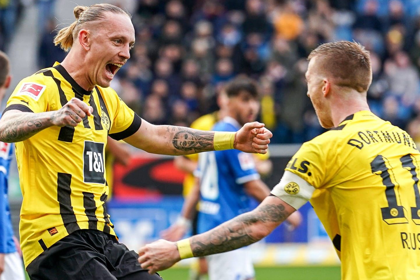 Spitzenreiter: Dortmunds Wolf (li.) und Reus feiern im Spiel in Hoffenheim.