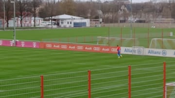 Jamal Musiala doing laps on the training ground.
