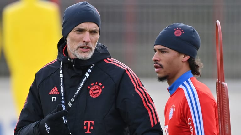 Trainer Thomas und Leroy Sané (r.): Der neue Trainer des FC Bayern begrüßte den Nationalspieler gleich mit einem Tritt in den Hintern.