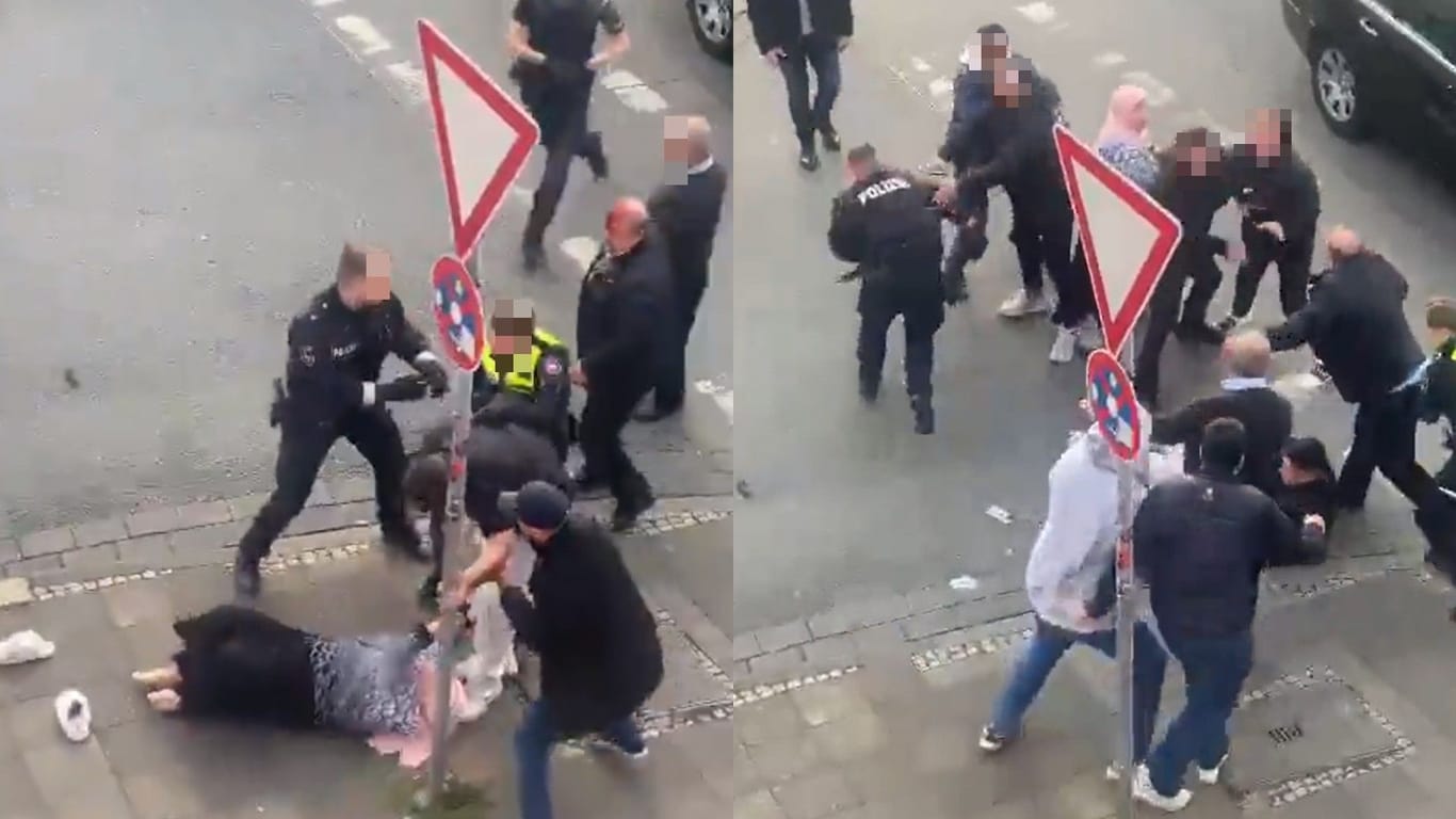 Bei Twitter kursiert ein Video der Prügelei: Man sieht, wie ein Faustschlag den Beamten trifft und die Frau zu Boden geht.