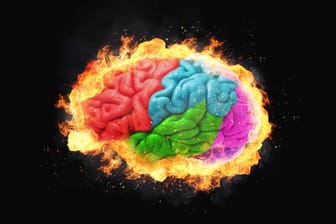 Illustration eines bunt gefärbten und brennenden Gehirns.