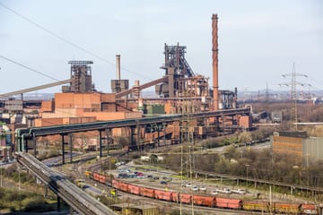 View of the Schwelgern 1 blast furnace (on the right), too "black giant" mentioned, and 2: The steel works in Duisburg-Bruckhausen is a city within a city – with its own port, road and rail network.