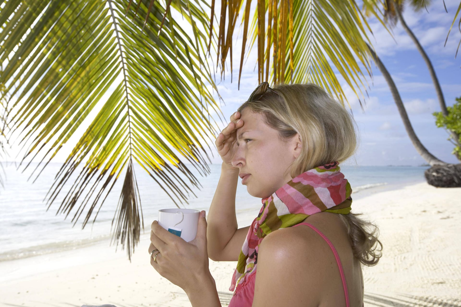 Krank im Urlaubsparadies: In einigen Ländern ist die Gefahr auf Krankheiten höher.