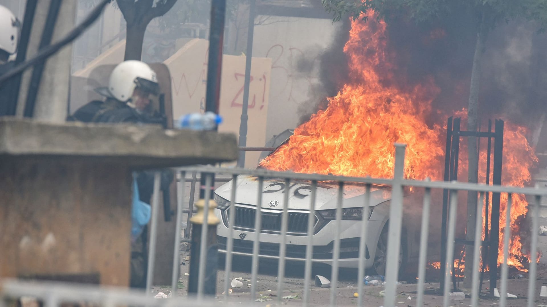 NATO Kosovo Force (KFOR) soldiers clash with local Kosovo Serb protesters in the town of Zvecan