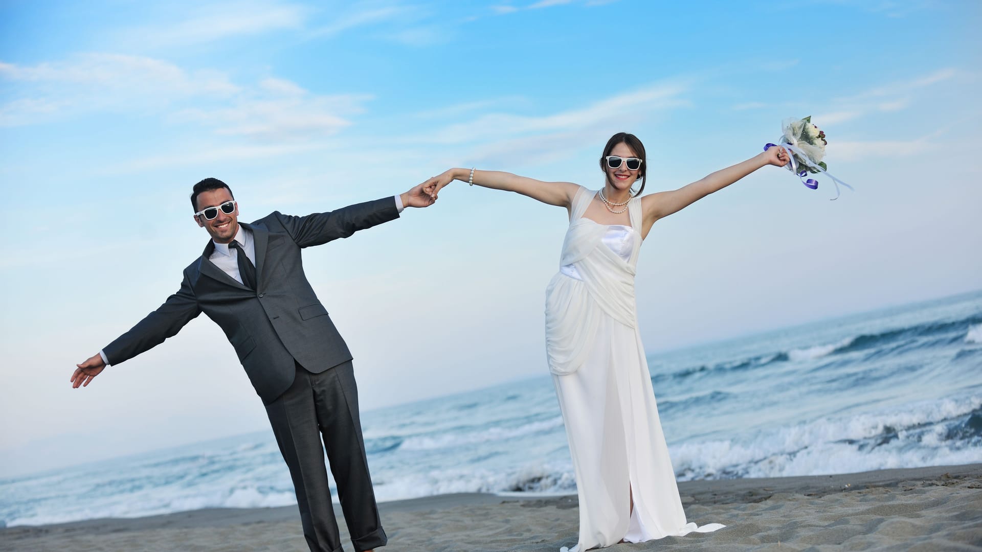 romantic beach wedding at sunset