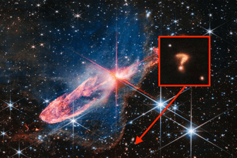 Das mysteriöse Fragezeichen: In der Mitte des Bildes sind die zwei jungen Sterne, darunter (wo der Pfeil hinzeigt) sieht man das "Fragezeichen".