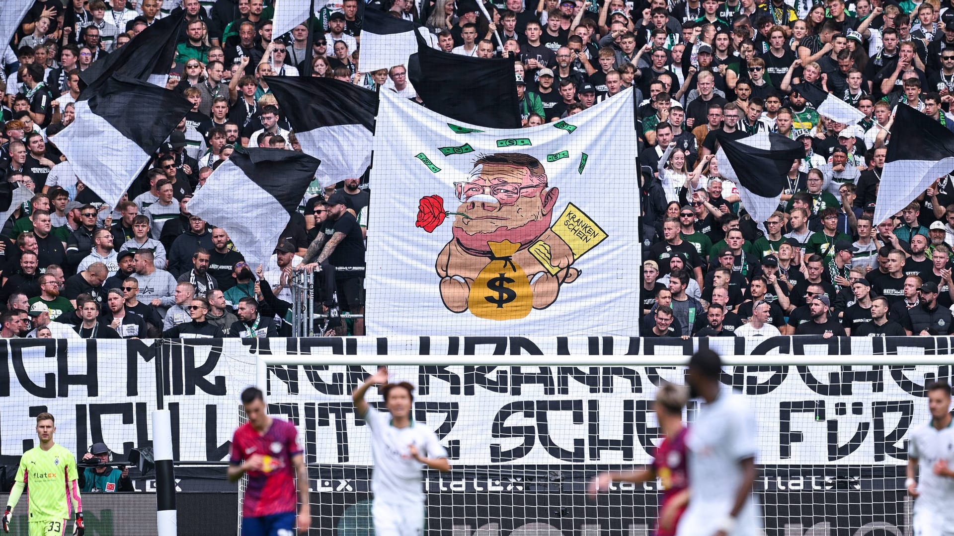Mit diesem Plakat empfingen die Gladbach-Fans Max Eberl.