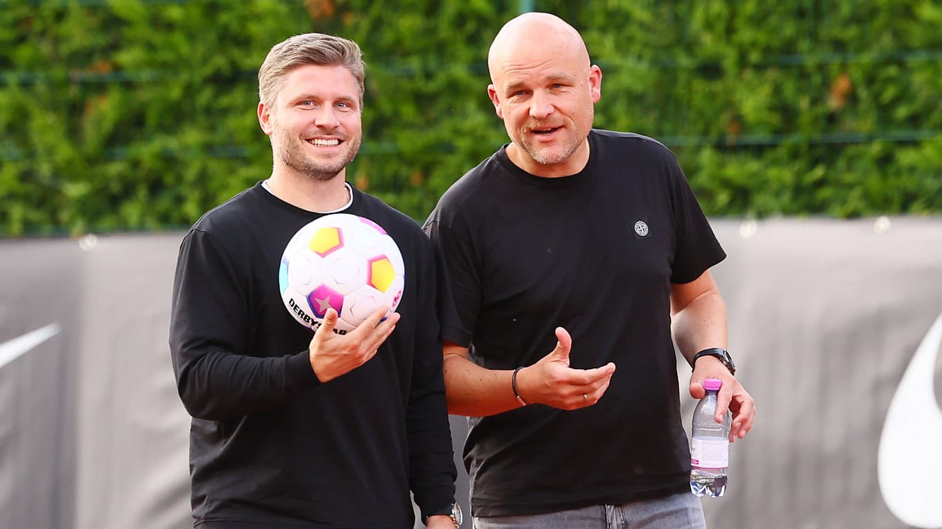 Felix Krüger (l.) im Sommer neben Rouven Schröder: Der 36-Jährige arbeitete als Sportkoordinator in Leipzig.