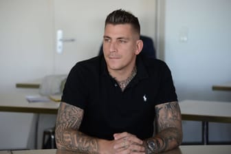 Rapper Gzuz in einem Gerichtssaal: Gleich wegen mehrerer Vergehen wurde er ursprünglich zu etwas mehr als einem Jahr Haft verurteilt.